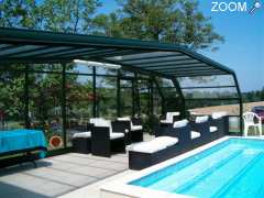 фотография de maison de caractère avec piscine couverte ,spa, sauna, jardin, terrasses 16pers.